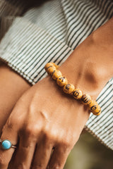 "PALO SANT WOOD BRACE"